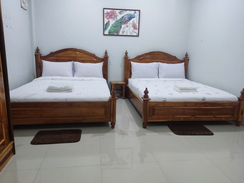 Standard 2 Beds for 4 people | Laptop workspace, free WiFi, bed sheets