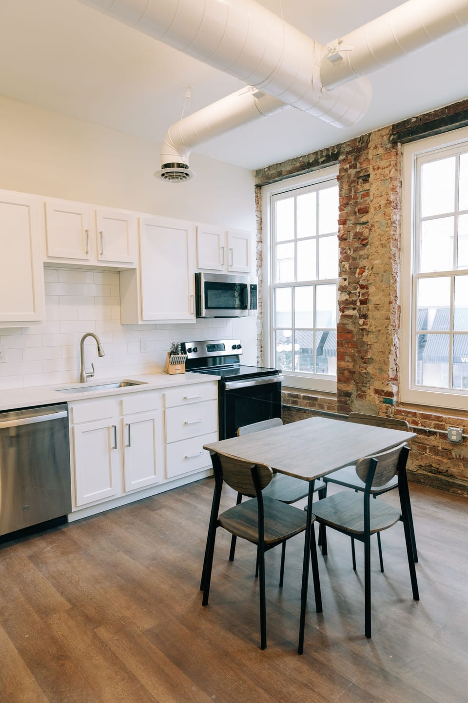 Standard Suite, 2 Bedrooms | Private kitchen | Microwave, oven, stovetop, dishwasher
