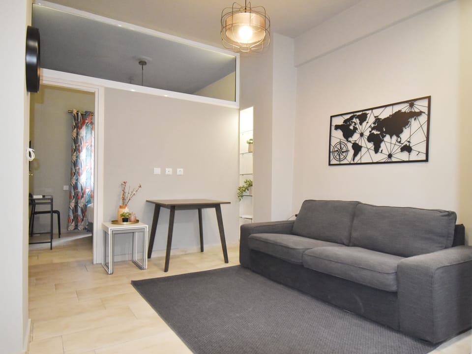 Apartment | Living area | 30-inch flat-screen TV with digital channels
