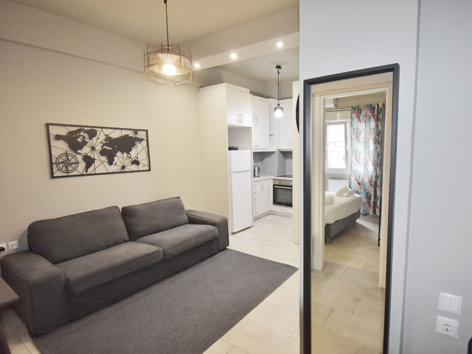 Apartment | Living area | 30-inch flat-screen TV with digital channels