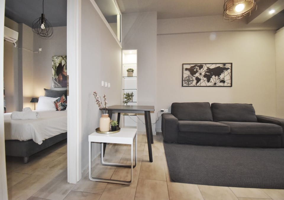Apartment | Living area | 30-inch flat-screen TV with digital channels
