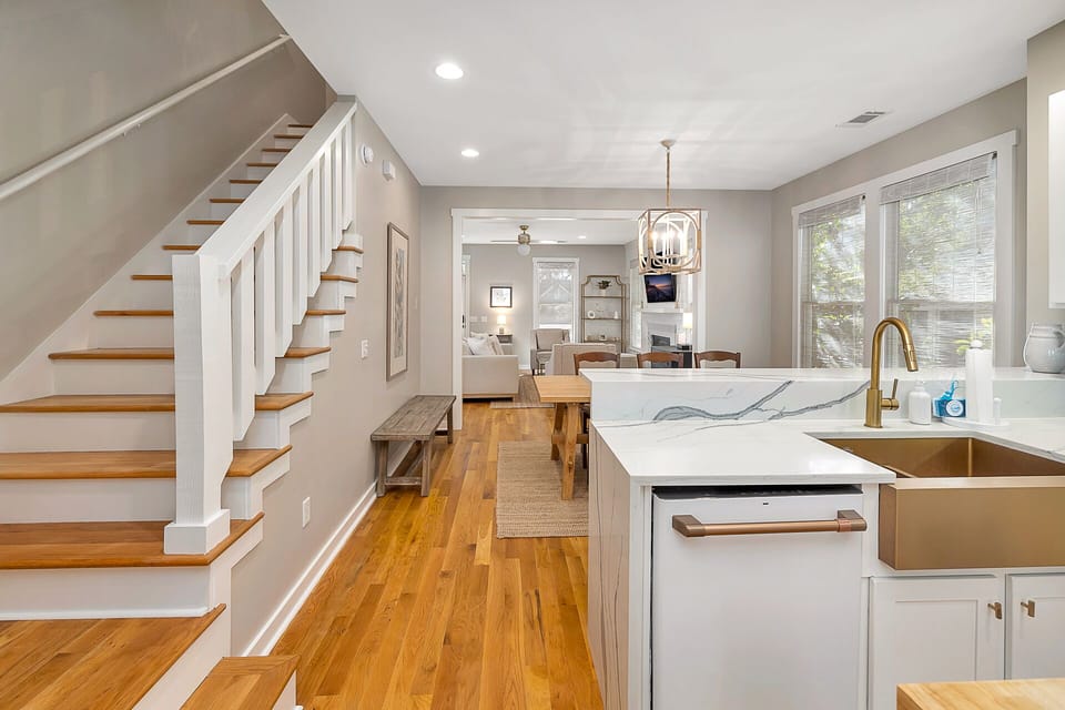 Open kitchen, dining, and living