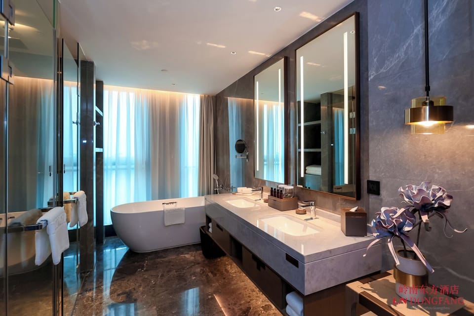 Business Suite King Size Bed Room | Bathroom | Hair dryer, slippers, towels