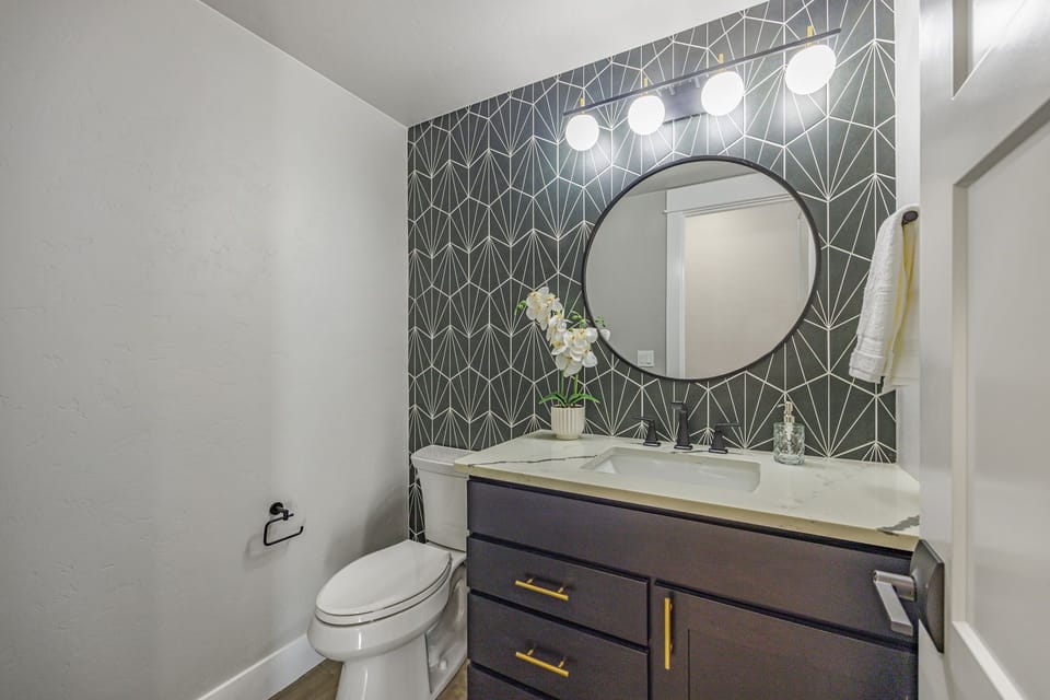 Bath Suite – Framed Mirror + Tile for Spa-Like Experience
