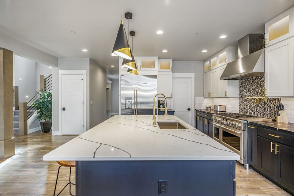 Kitchen – Stainless Appliances + Island for Easy Meal Prep