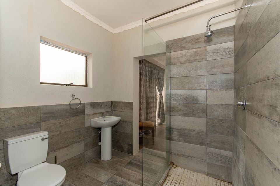 Family Room, 2 Bedrooms, Garden View | Bathroom | Separate tub and shower, rainfall showerhead, hair dryer (on request)