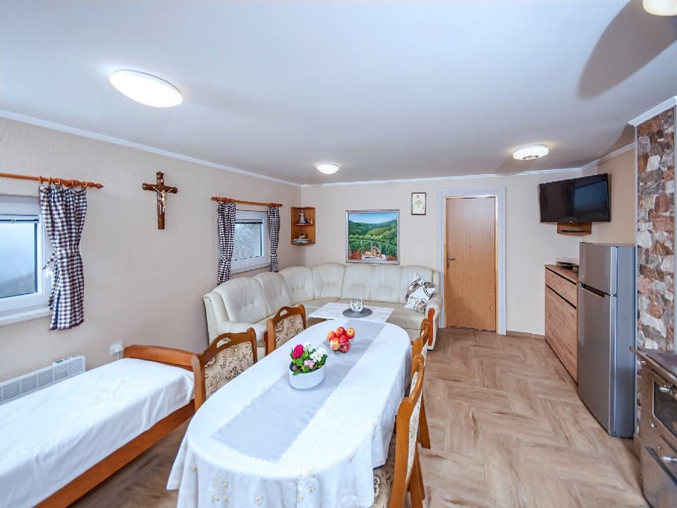 House (One Bedroom Holiday Home with Swimmin) | Living room | 25-inch flat-screen TV with satellite channels, TV