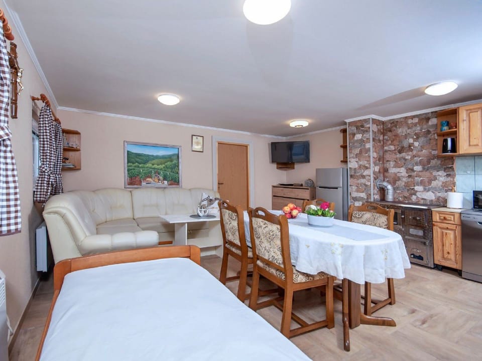 House (One Bedroom Holiday Home with Swimmin) | Living room | 25-inch flat-screen TV with satellite channels, TV