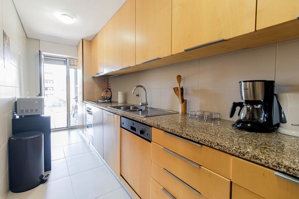 Our spacious kitchenette counts with all the essentials you might need during your stay, like an oven, stove, microwave, dishwasher and even a washing machine, perfect for bigger stays!