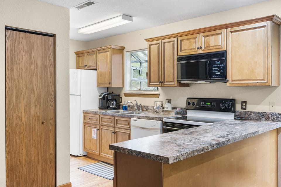 Get inspired to cook and entertain in the stylish and fully equipped kitchen, complete with all the modern amenities you need to whip up a delicious meal