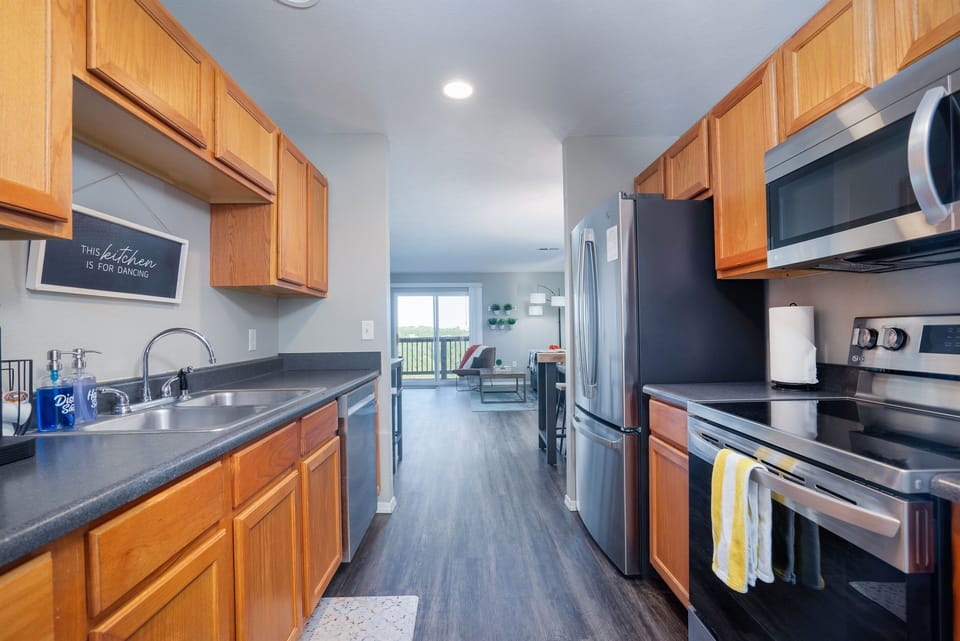 Get inspired to cook and entertain in the stylish and fully equipped kitchen, complete with all the modern amenities you need to whip up a delicious meal.