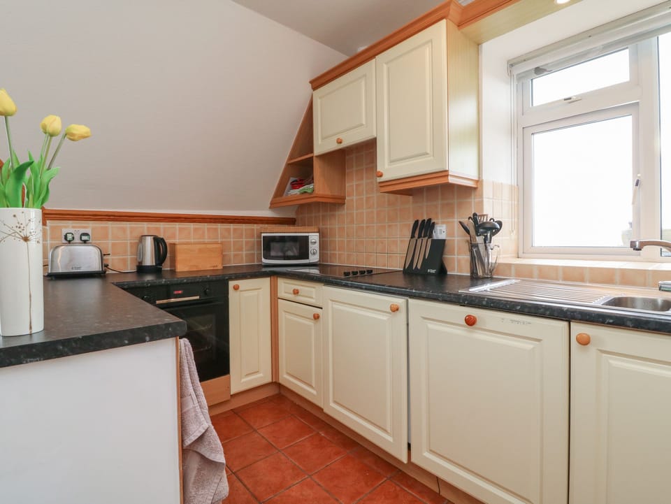 Fridge, dishwasher, electric kettle, toaster