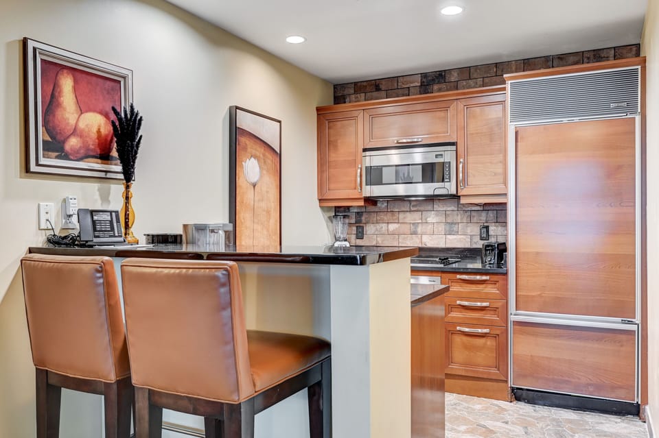 Granite and stainless throughout kitchen. New Keurig coffee maker provided