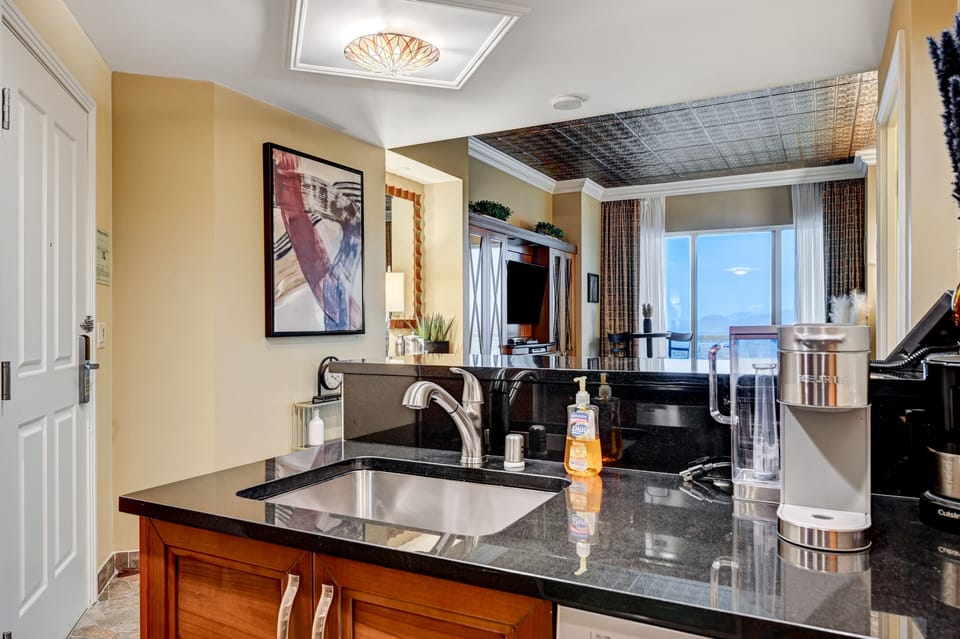 Full kitchen open to living room.