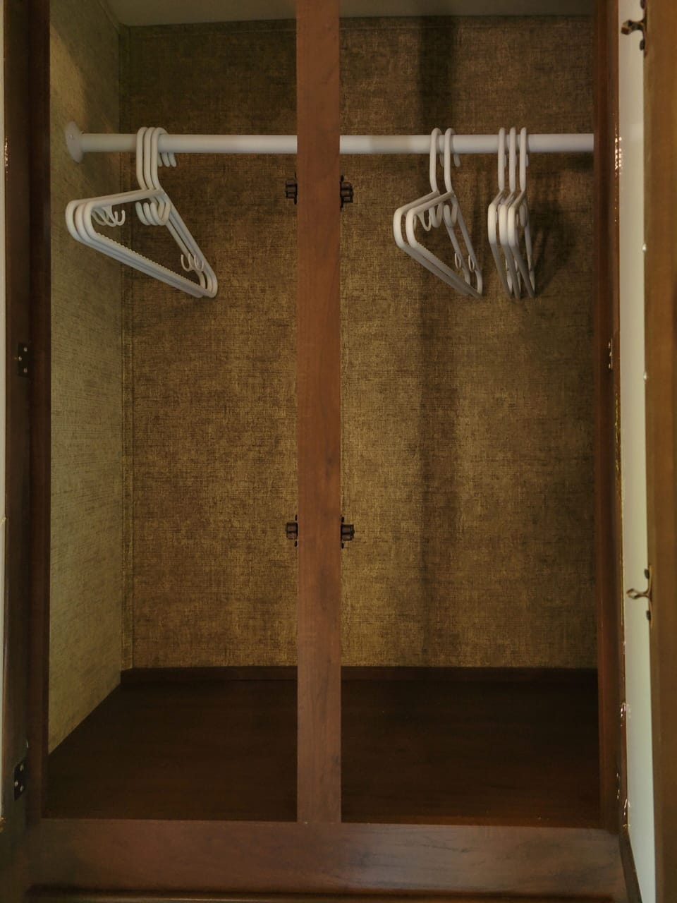 Lots of room to hang your clothes so you won't have to live out of your suitcase