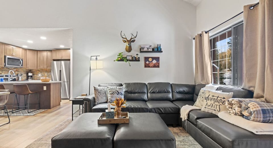 Relax on the cozy leather sofa, offering a perfect blend of comfort and style for your downtime.
