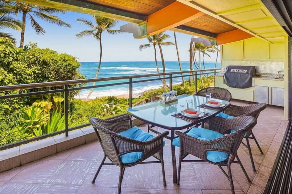Luxury built-in grill offering convenient al fresco cooking with views.