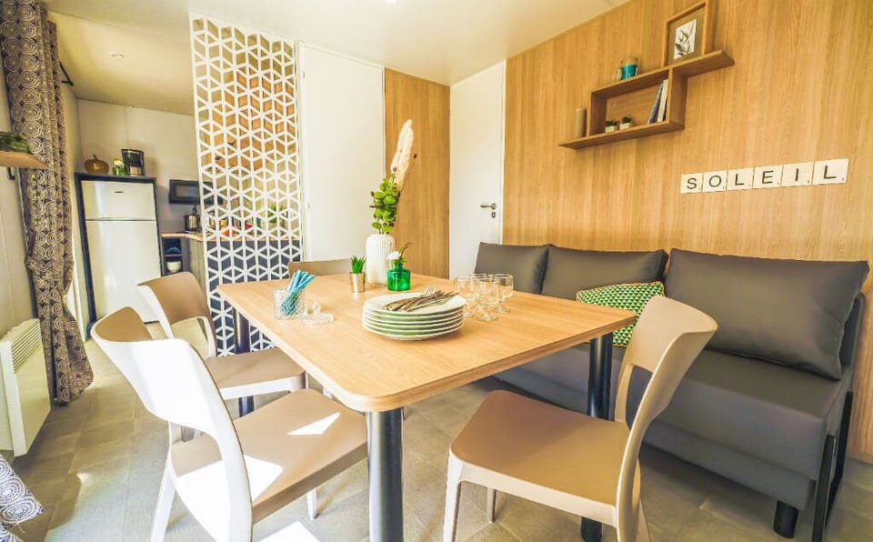 A comfortable indoor dining nook, ideal for family meals or game nights.