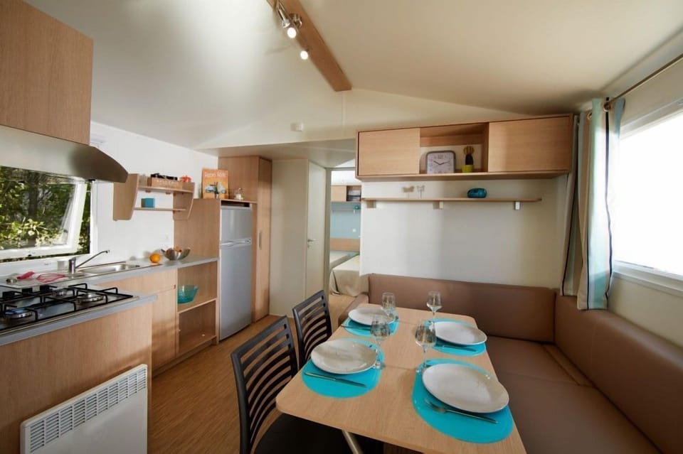  Spacious dining area within the cabin for a homely feel.