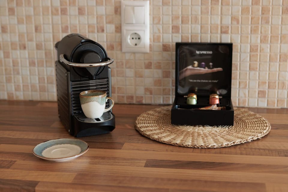 Junior Suite | Private kitchen | Full-size fridge, oven, espresso maker, coffee/tea maker