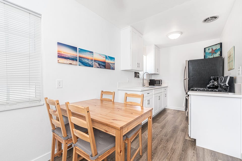 The dining area includes seating for four. Due to the moderate climate, this home - like most in the area - does not include central air.
                