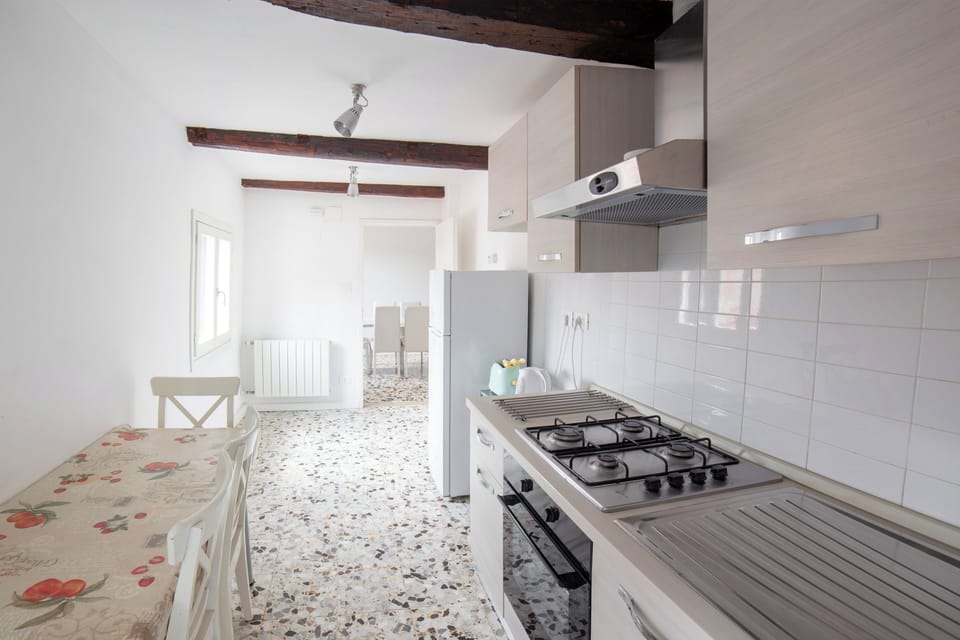 Apartment | Private kitchen | Full-size fridge, oven, stovetop, espresso maker