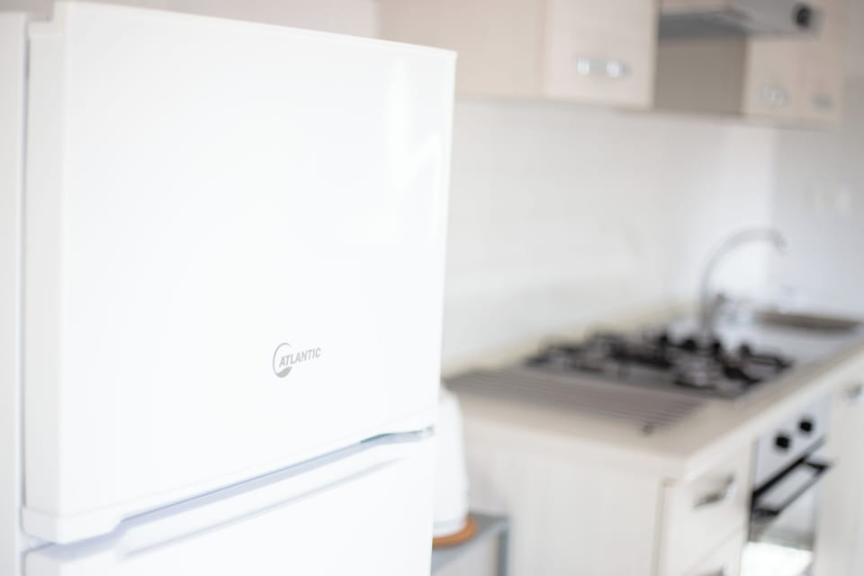 Apartment | Private kitchen | Full-size fridge, oven, stovetop, espresso maker
