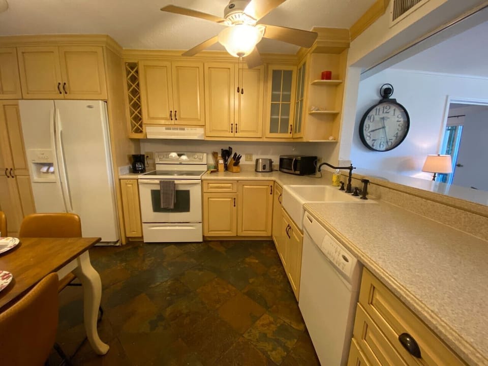 A charming kitchen corner with quality appliances, generous storage, and warm characterful details throughout