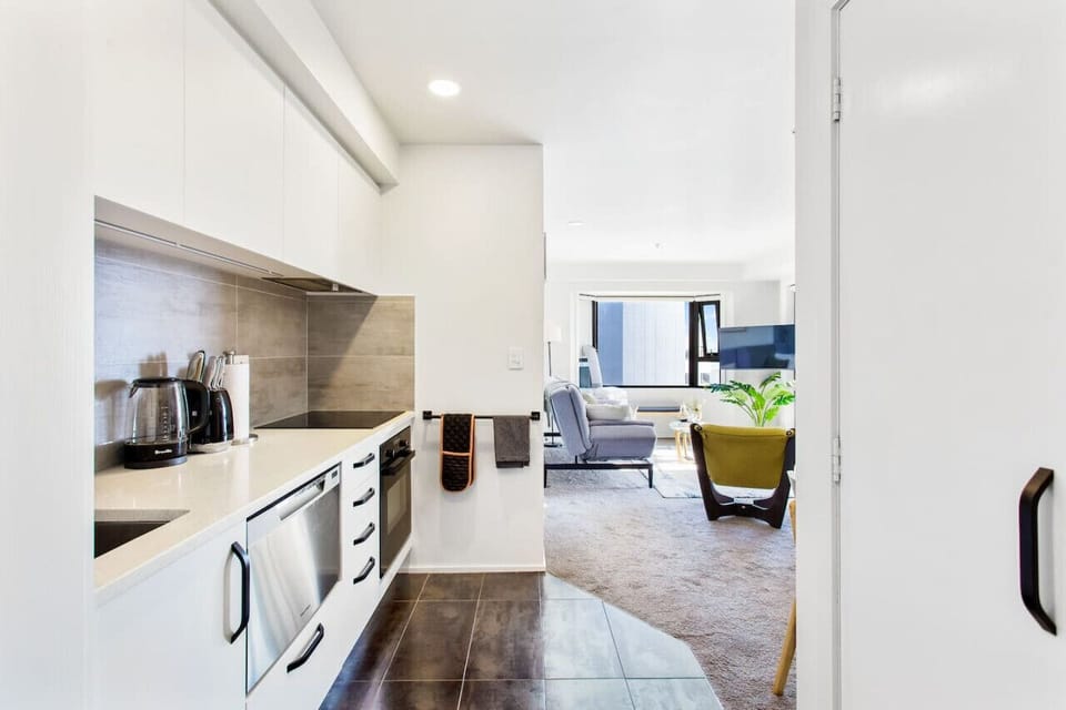 The fully equipped galley kitchen in the open-plan living area.