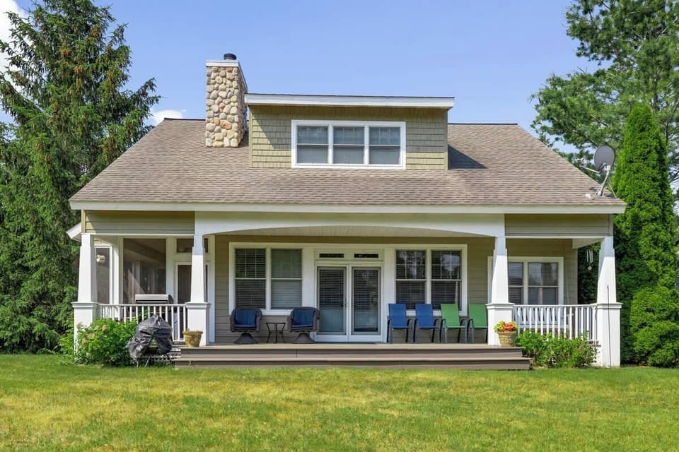 Step outside and breathe in the fresh Michigan air on this charming back porch.