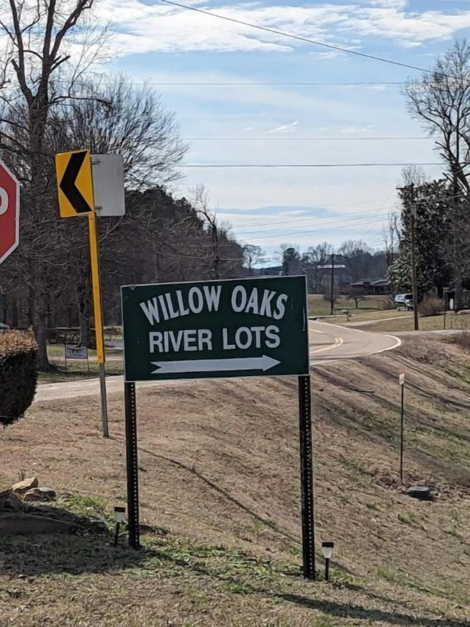 Drive past main house to this sign and turn right. Go to first road turn right.