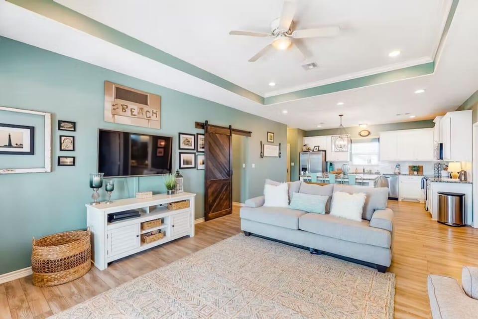 You'll love this open floorplan and coastal chic decor