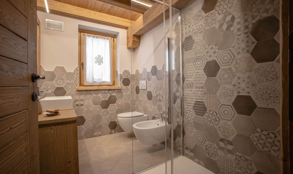 Superior Room | Bathroom | Shower, hair dryer, bathrobes, slippers