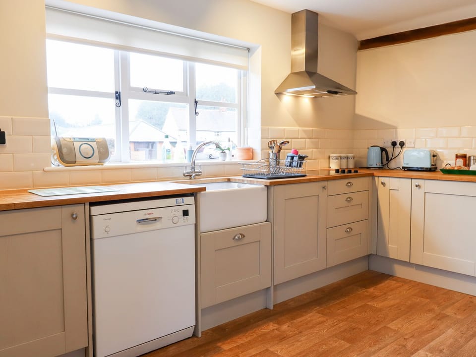 Fridge, electric kettle, toaster, cookware/dishes/utensils
