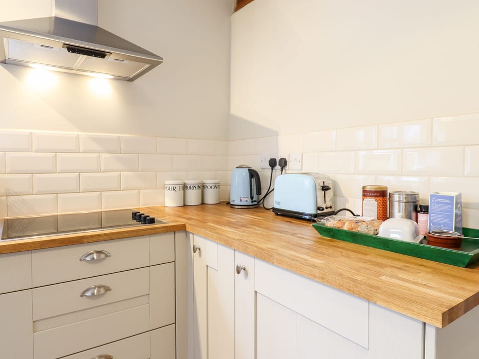 Fridge, electric kettle, toaster, cookware/dishes/utensils