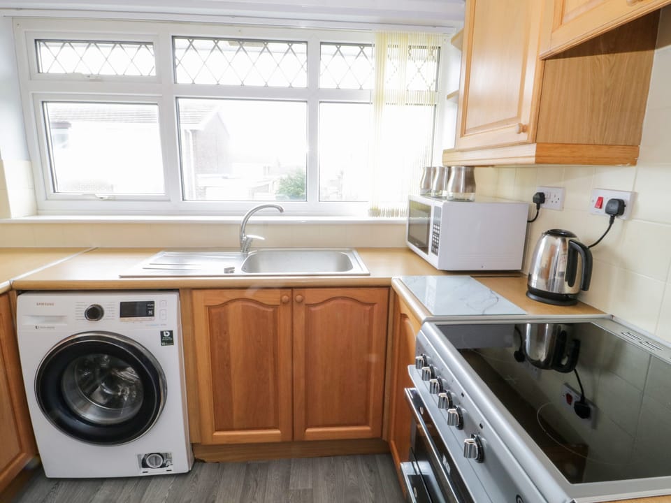 Fridge, electric kettle, toaster, cookware/dishes/utensils