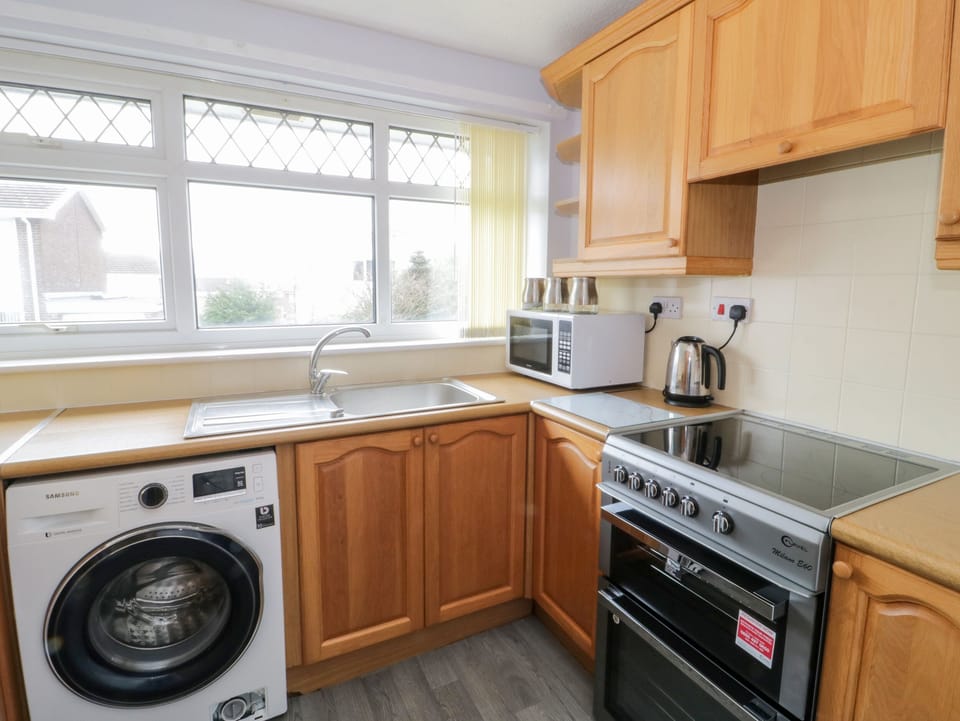 Fridge, electric kettle, toaster, cookware/dishes/utensils