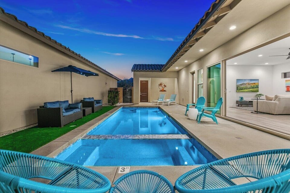 Take a seat by the pool and enjoy the starry night above.