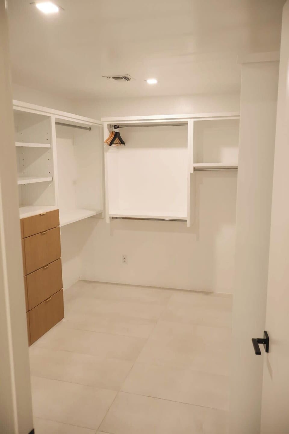 Massive walk-in closet within master bedroom