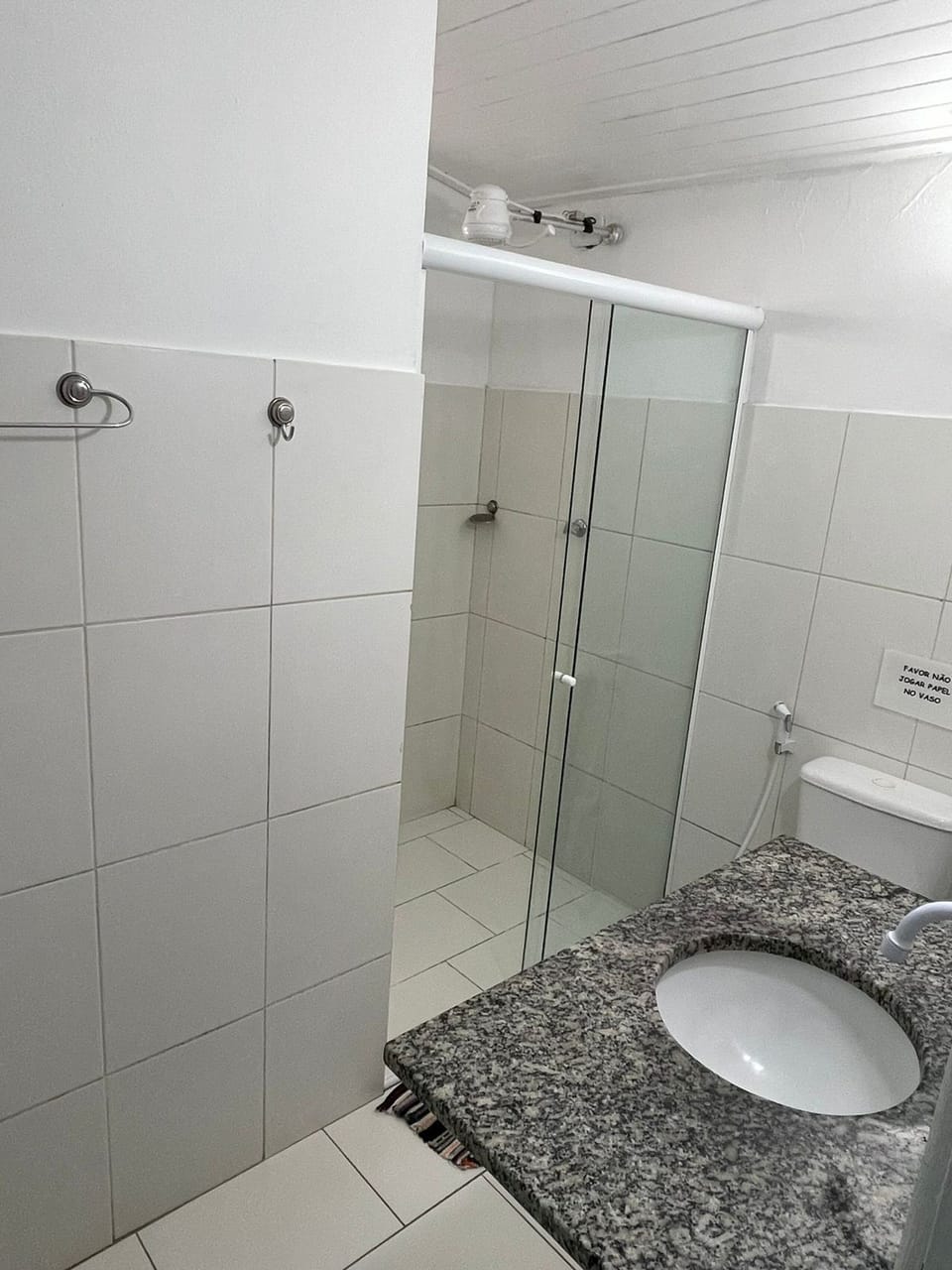 Basic Suite | Bathroom | Shower, rainfall showerhead, towels, soap