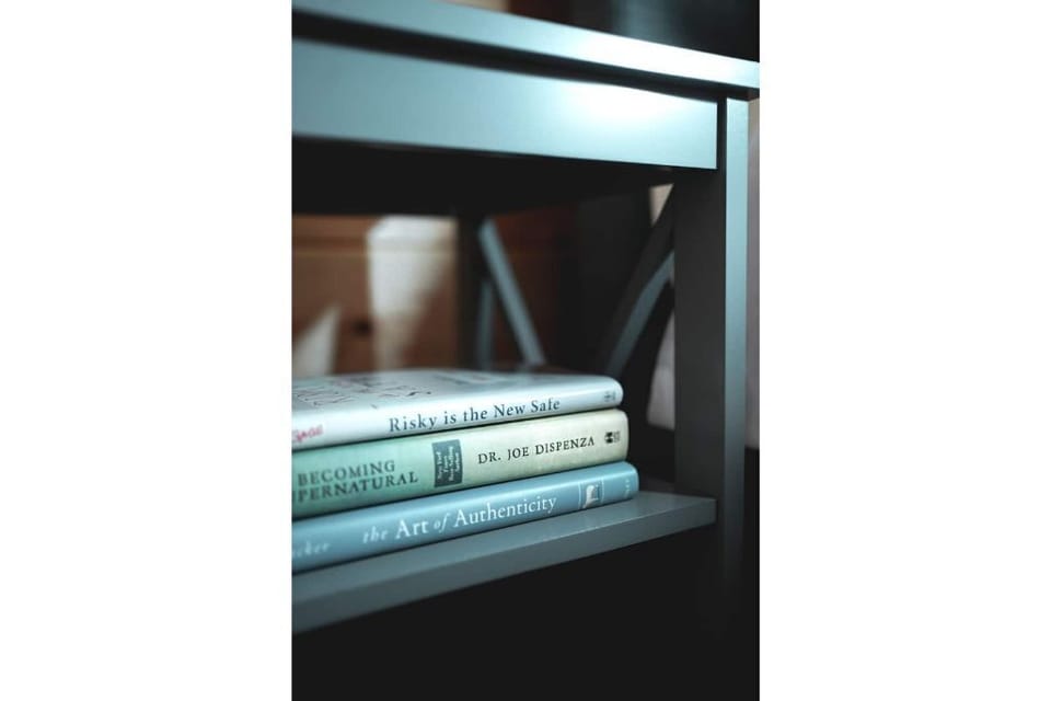 Books available on side table.