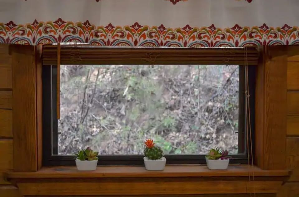 Window above couch.