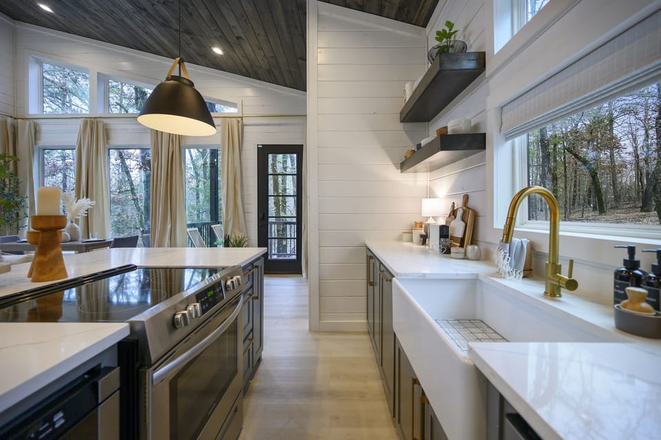 Gorgeous quartz counters and modern open shelving