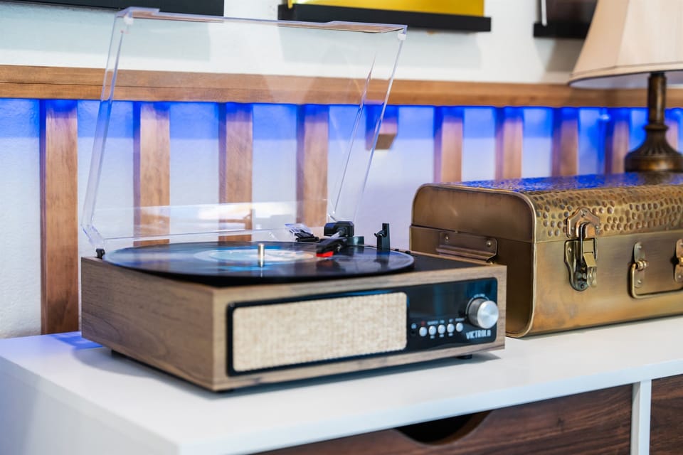 Our All-in-1 Bluetooth Record Player seamlessly combines retro charm with cutting-edge technology. Enjoy your favorite vinyl records on its 3-Speed Turntable while the built-in speakers fill your space with rich, immersive sound.