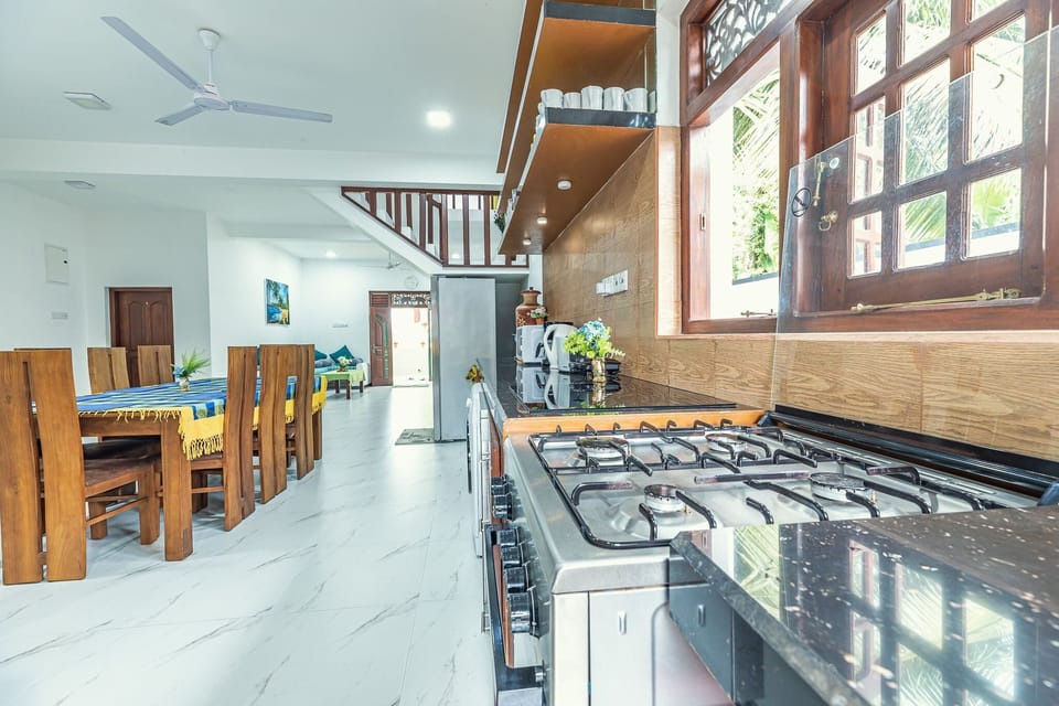 Villa | Private kitchen | Fridge, microwave, oven, dishwasher