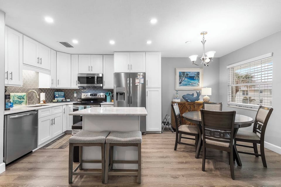 There are two additional seats at the kitchen island
