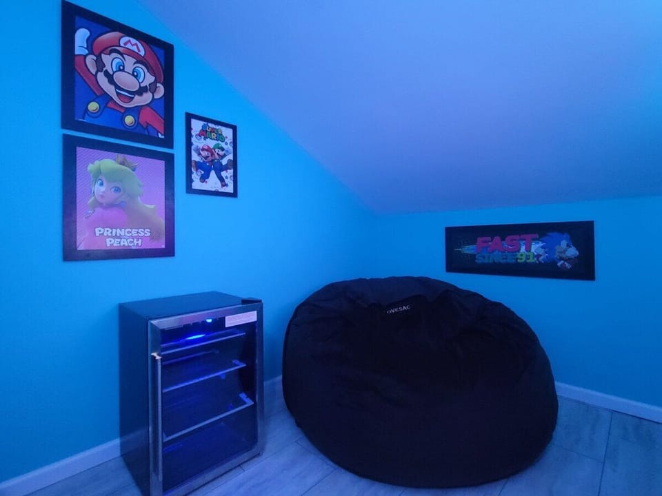 Kids and teens have a smart TV, Lovesac, fridge, and Xbox to enjoy.