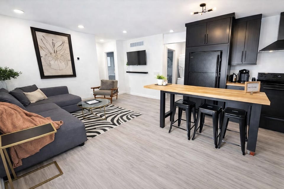 Spacious open living area with modern finishes & flexible seating