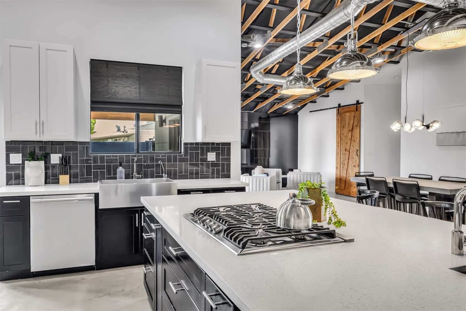 Stove and cooking space. Island and seating.