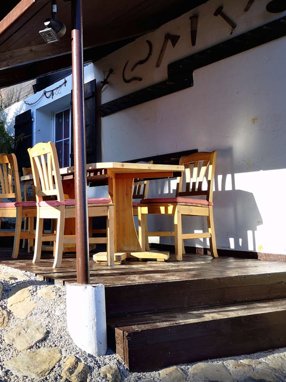 Chalet terrace / veranda West view in spring